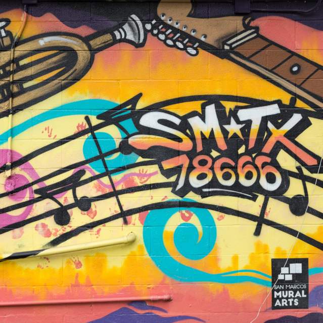 Close-up view of the Electric Jazz mural in San Marcos, Texas