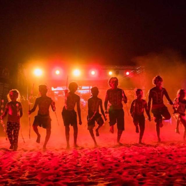 Karijini Experience traditional Dance at night under lights