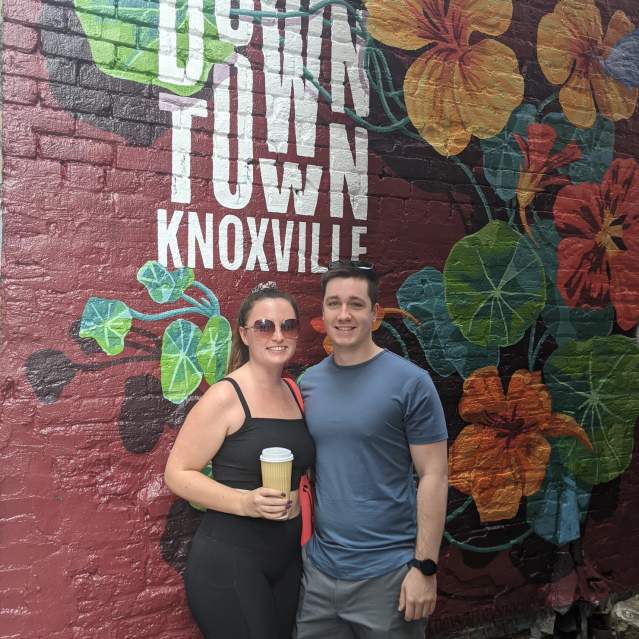 Couple in Knoxville in front of a Mural