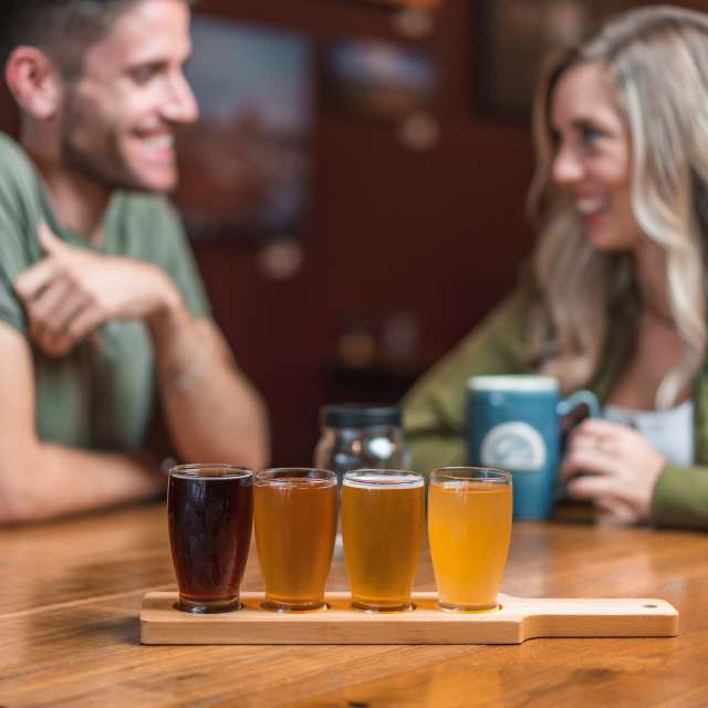 A couple Enjoying A Drink At Burd's Nest In The Cumberland Valley, PA