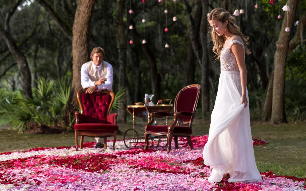 Four Seasons Resort Orlando wedding couple on flowers