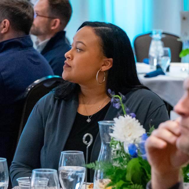 Woman at a meeting event
