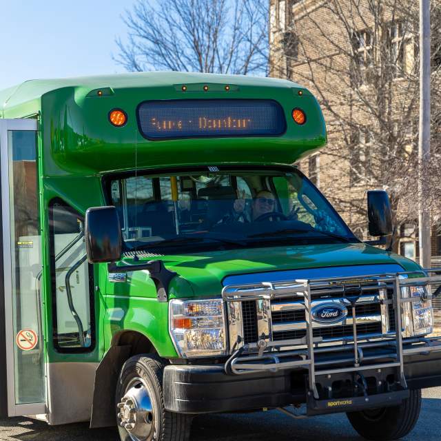 City Go bus in Salina Kansas with Bus driver posing making peace signs