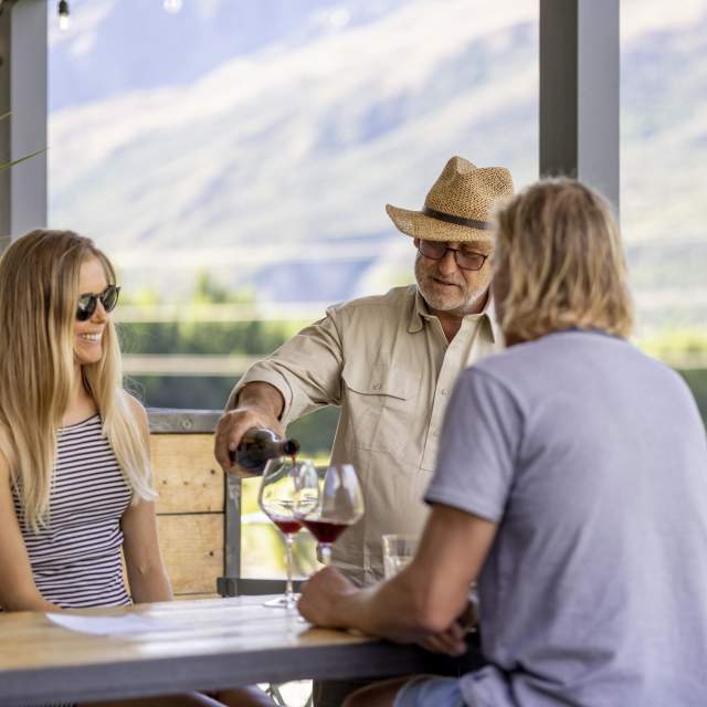 People enjoying a wine tasting in summer at Mt Rosa Wines