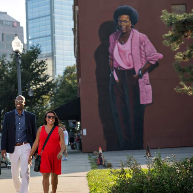 The mural of Indianapolis poet Mari Evans looms over visitors to Mass Ave