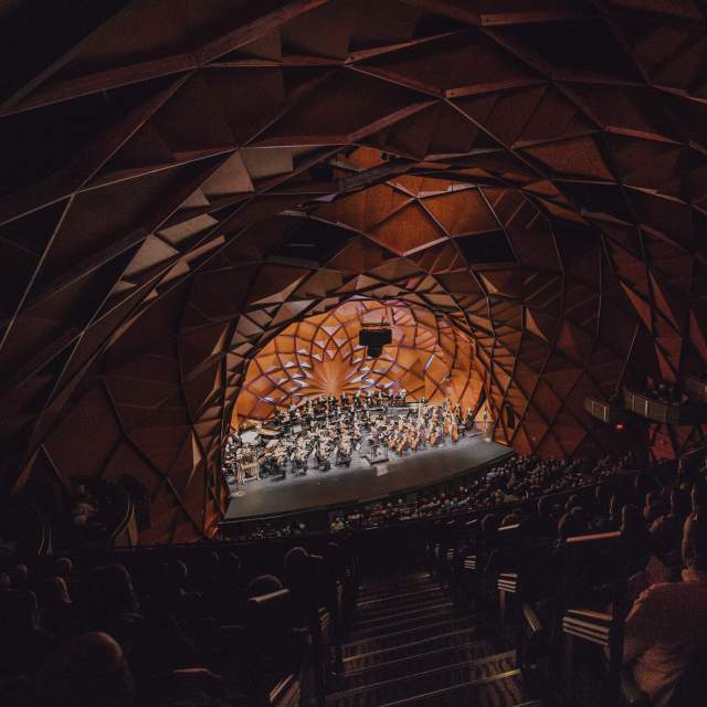 view overlooking a crowd at the globe news center watching the amarillo symphony perform