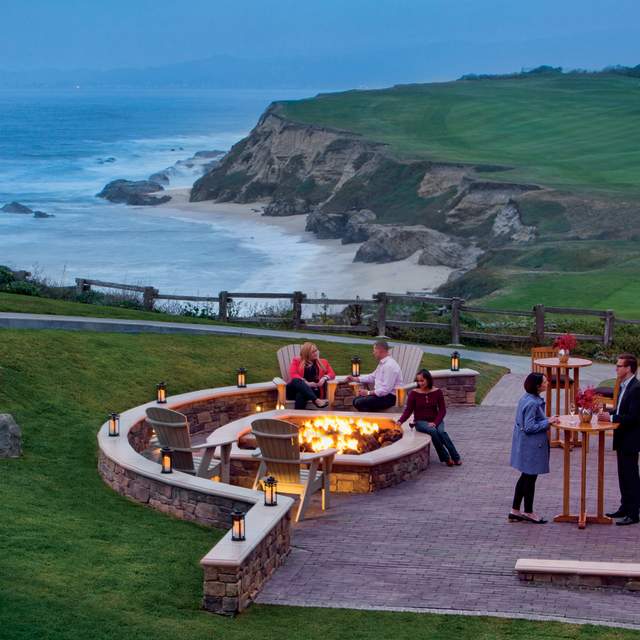 View of the outdoor fireplace at the Ritz Carlton Half Moon Bay Resort.