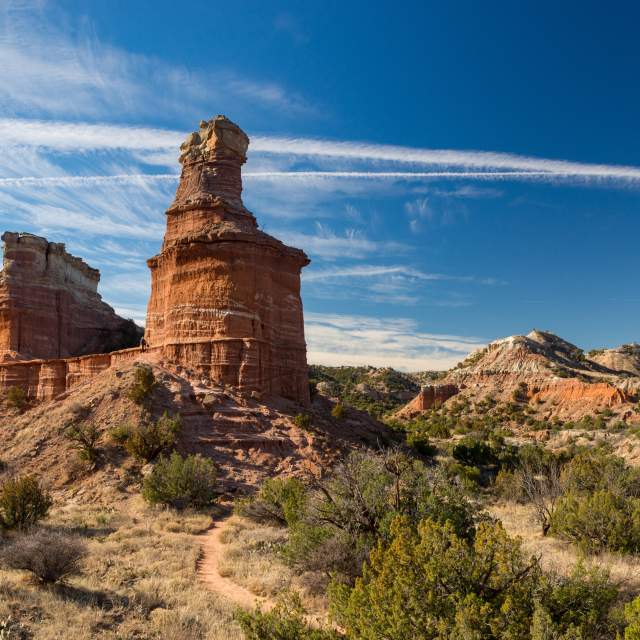 photo looking up at the lighthouse rock formation in palo duro canyon in the afternoon