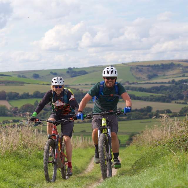 A couple of cyclists from Marmalade MTB on the South Downs Way in Sussex