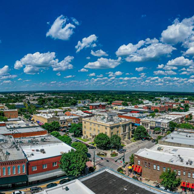 Wide angle drone shot of downtown McKinney