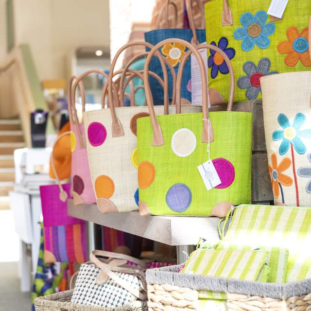 Display of tote bags at Aston Pottery
