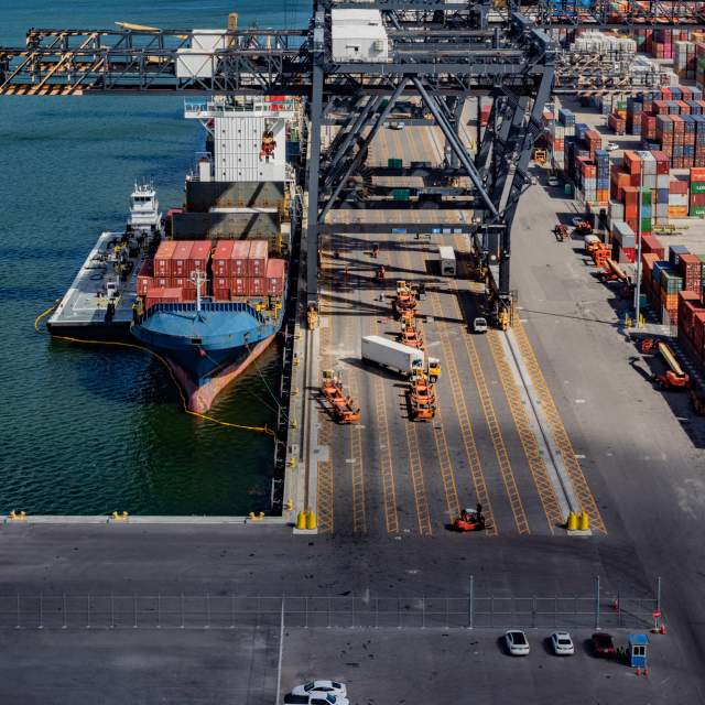 Container ship being loaded.
