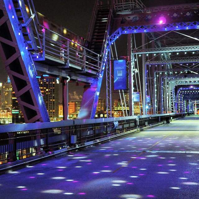 The Purple People Bridge across the Ohio river lighted up for the holidays with the Cincinnati skyline in the background, viewed from Newport, Ky.