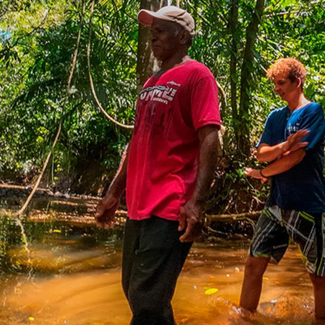 Hikers on a trail in the woods on the Pacific Coast of Veraguas.