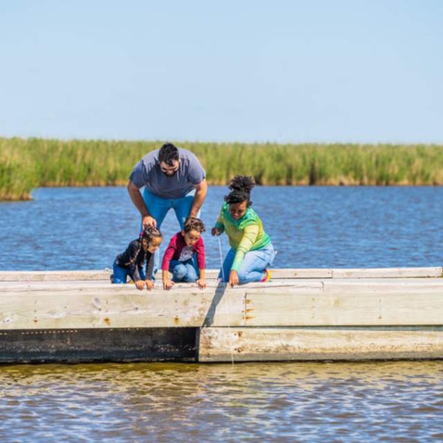 family crabbing along the Creole Nature Trail