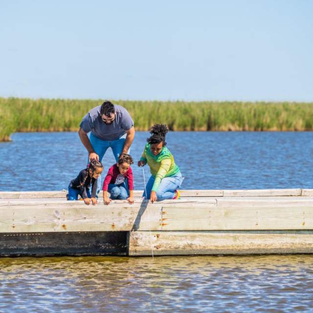 family crabbing along the Creole Nature Trail