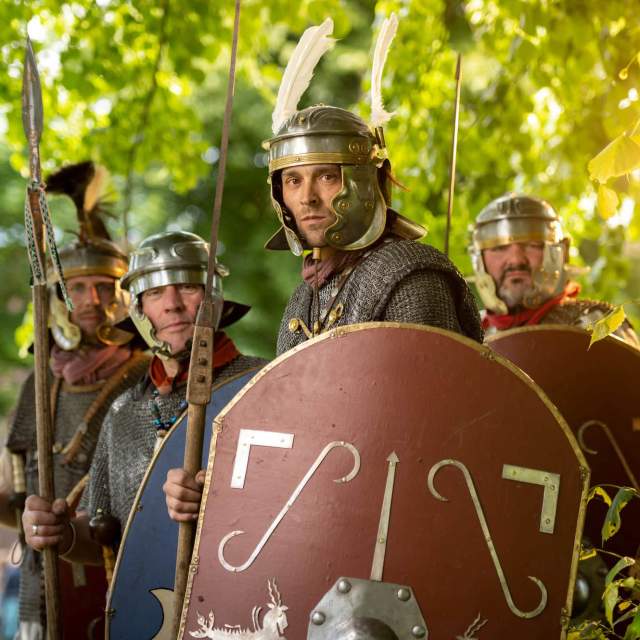 People dressed as roman soldiers