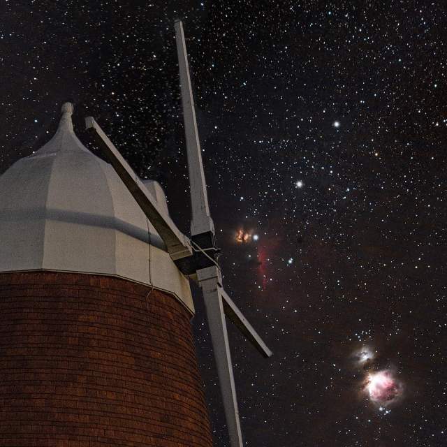 Halnaker Windmill with starry skies behind