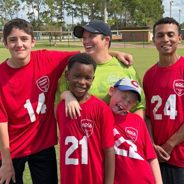 Kids wearing sports shirts for OCA charity
