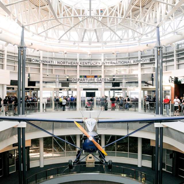 An airplane suspended in front of the gate to departures at CVG - the Cincinnati and Northern Kentucky airport