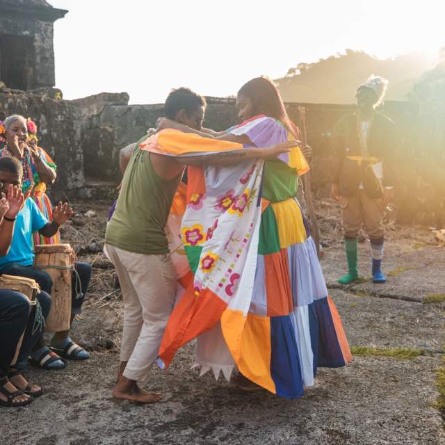 Congo dancing afro music dressed with colorful polleras at Fuerte San Fernando