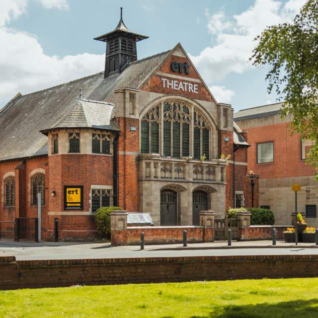 The exterior of East Riding Theatre in Beverley with the coach drop off bays in front.