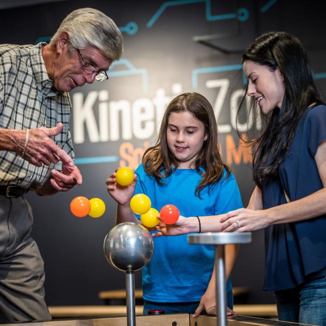 Orlando Science Center's Mini Maker Faire dad and girls