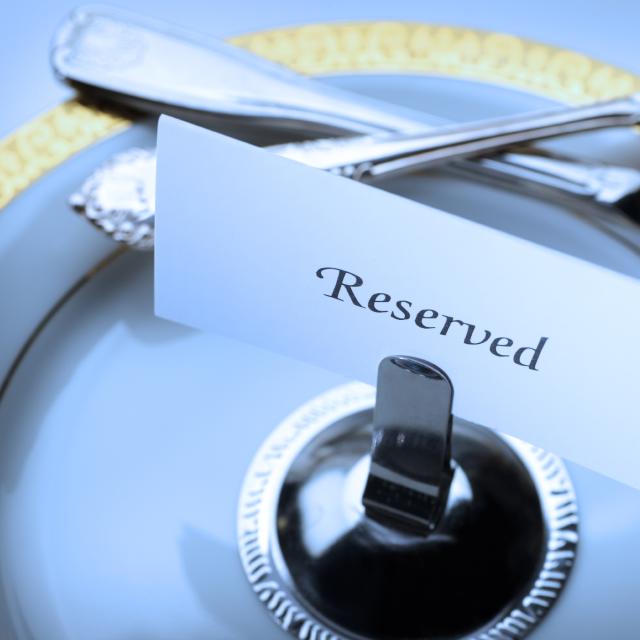Reserved seating for a formal dinner.