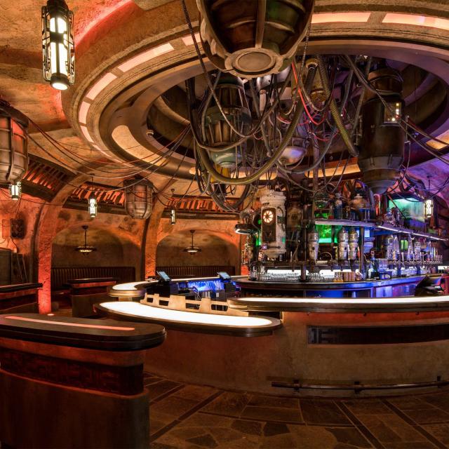 When guests visit Star Wars: Galaxy’s Edge at Disneyland Park in California and opening Aug. 29, 2019, at Disney’s Hollywood Studios in Florida, they’ll find Oga’s Cantina – a local watering hole where galactic travelers unwind, conduct business and maybe even encounter a friend. Patrons of the cantina can sample the famous concoctions created with exotic ingredients using “otherworldly” methods. (David Roark, photographer)