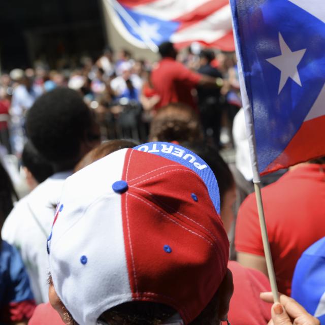 Puerto Rican pride comes in red white and blue at a PR day parade.