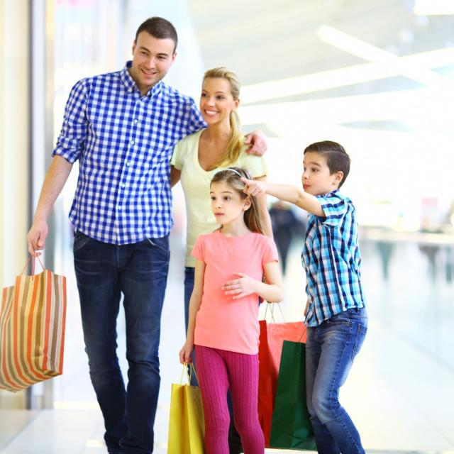 family of four shopping