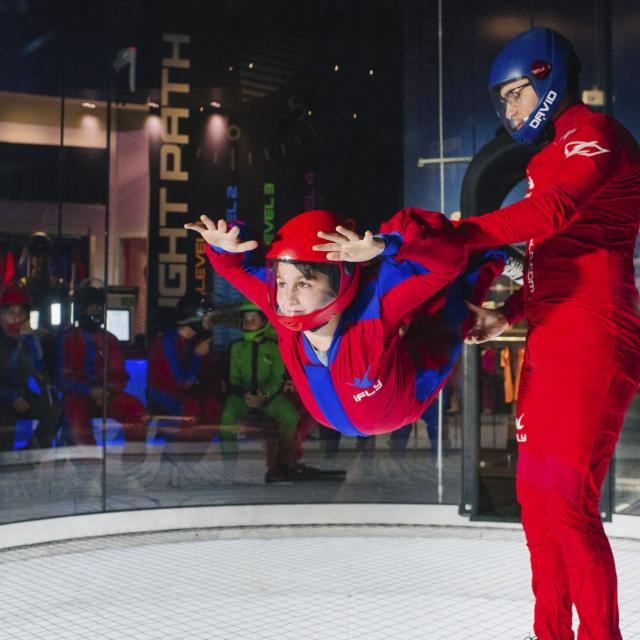 IFLY Orlando Indoor Skydiving child flyer with trainer