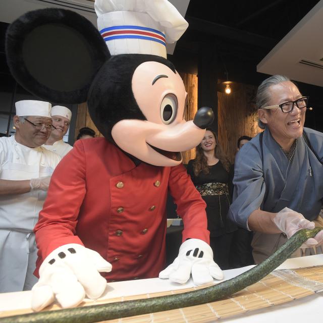 Chef Masaharu Morimoto and Mickey Mouse at the Grand Opening of Morimoto Asia restaurant in Disney Springs