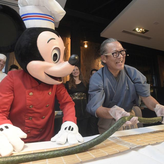 Chef Masaharu Morimoto and Mickey Mouse at the Grand Opening of Morimoto Asia restaurant in Disney Springs