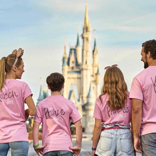 Family wearing matching shirts at Magic Kingdom Park, part of the Walt Disney World Resort