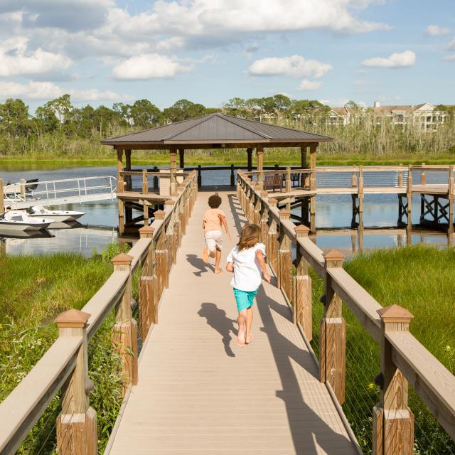 The Grove Resort Orlando boys running on dock