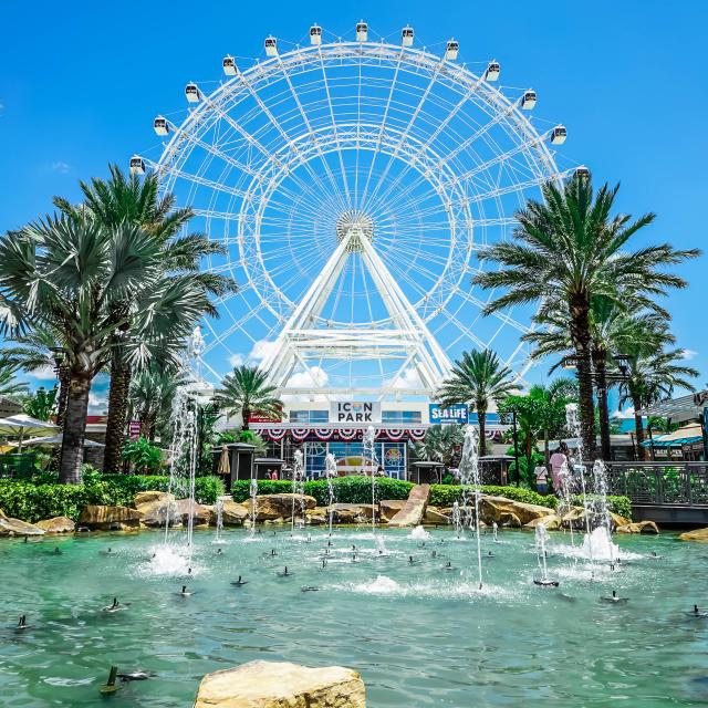 The fountains in front of The Wheel at ICON Park during the day