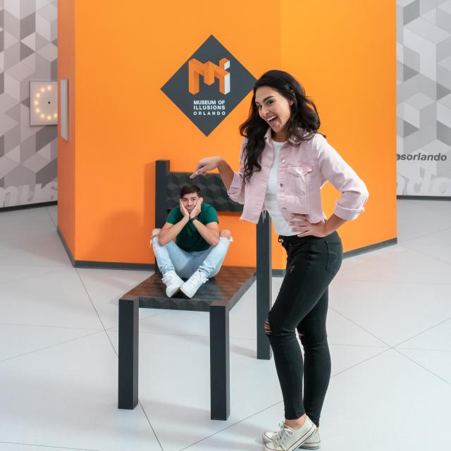 museum of illusions beuchet chair boy girl