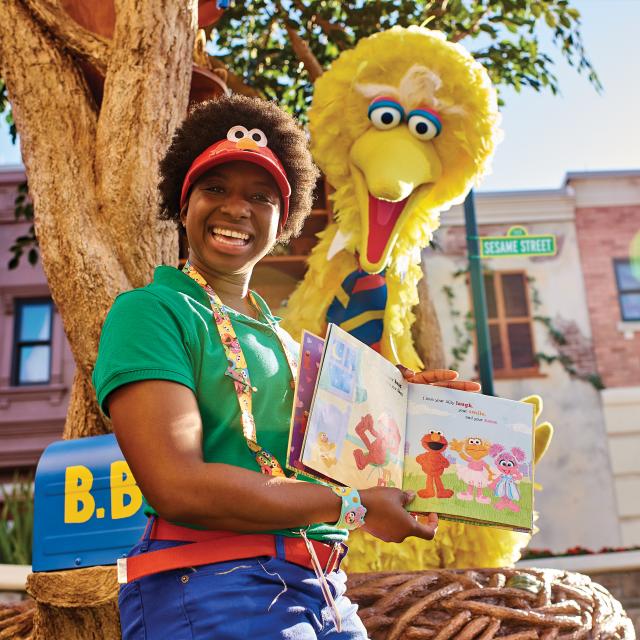 Big Bird reading a book in Sesame Street Land at SeaWorld Orlando