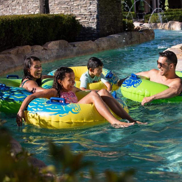 Family in lazy river at Signia by Hilton Orlando Bonnet Creek