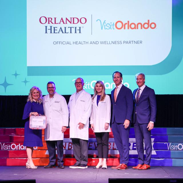 From left to right: Casandra Matej, president and CEO, Visit Orlando; Dr. Antonio Crespo, Managing Physician, Orlando Health Medical Group - Infectious Diseases; Dr. Don Plumley, Pediatric Surgeon and Trauma Medical Director at Orlando Health Arnold Palmer Hospital for Children; Susan Stallard, Associate Vice President of Quality, Orlando Health; Thibaut van Marcke, President of Orlando Health Dr. P. Phillips Hospital and Brian Comes, Chair, Board of Directors, Visit Orlando.