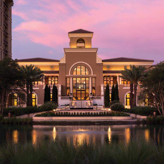 Four Seasons Resort grounds entrance at dusk