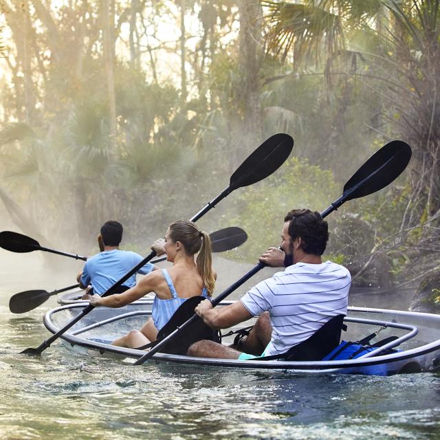 Couple kayaking through Kings Landing at Wekiva River