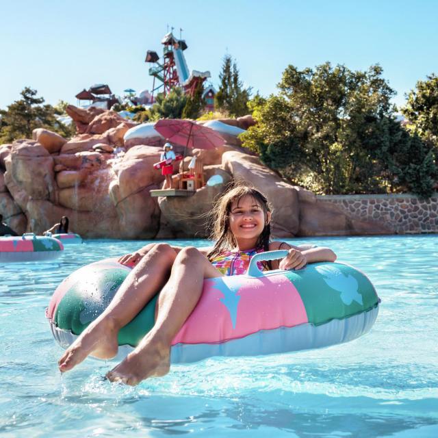 Young girl on a float at Disney's Blizzard Beach Water Park