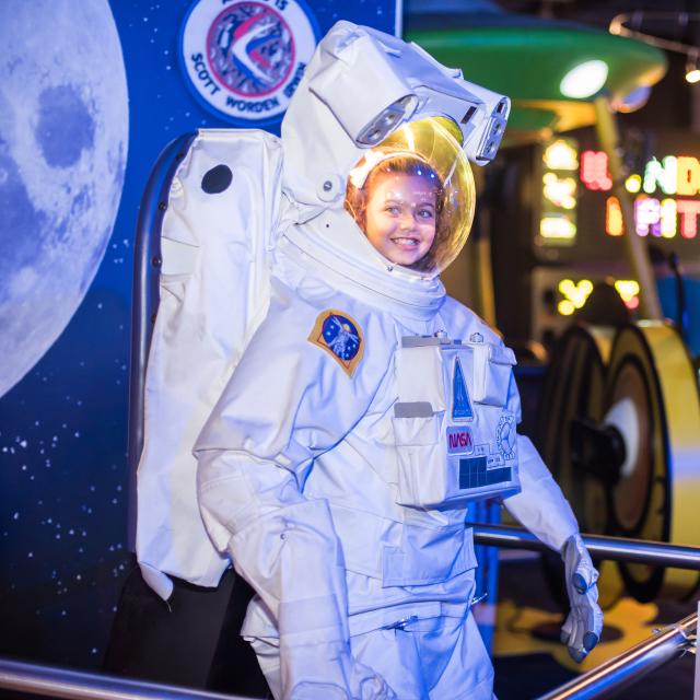 WonderWorks girl in astronaut suit