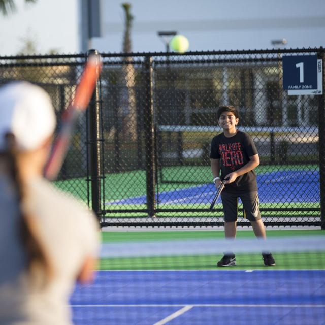 USTA National Campus boy playing at Nemours Family Zone