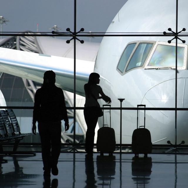People waiting for a flight at an airport