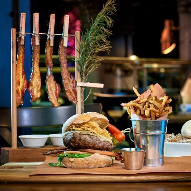Hamburger and fries at The Edison at Disney Springs