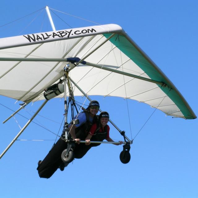 Two people tandem hang gliding at Wallaby Ranch Hang Gliding Flight Park, near Orlando, Florida.
