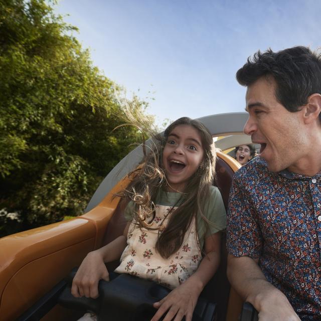 A father and daughter on a Rollercoaster